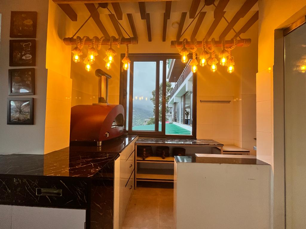 Try the wood-fired pizza @Smoked Paprika- The Live Kitchen